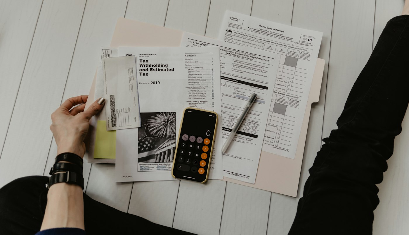 Calculator and pension documents
